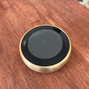 Google Nest 3rd generation gold thermostat learning